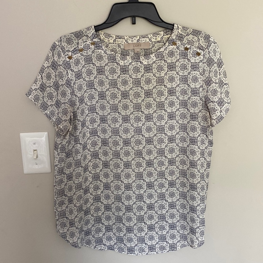 Black and white blouse with gold button detail